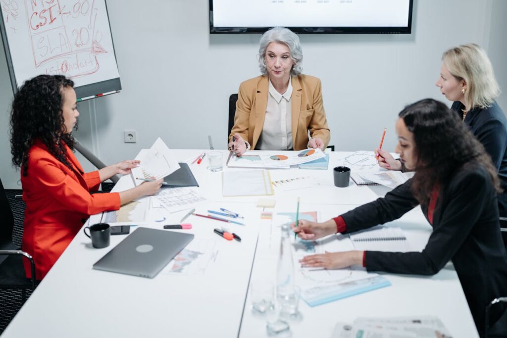 pexels photo 8424525 A diverse team of businesswomen engaged in a collaborative meeting at the office.